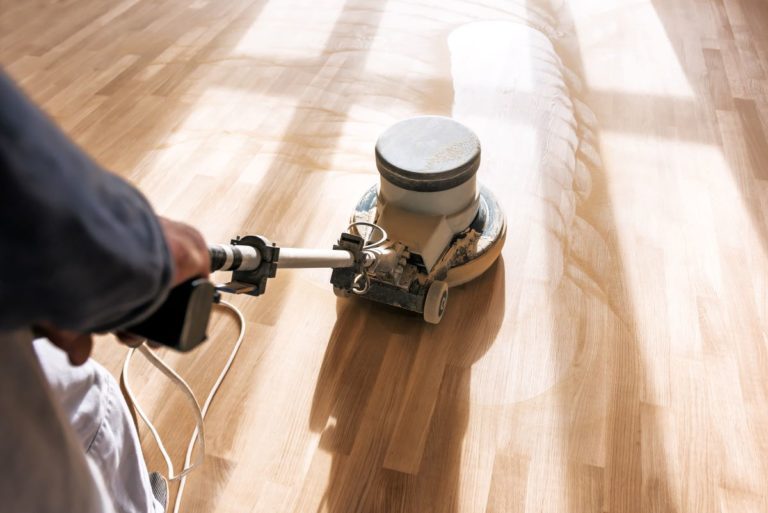 sanding a real wood floor to restore it